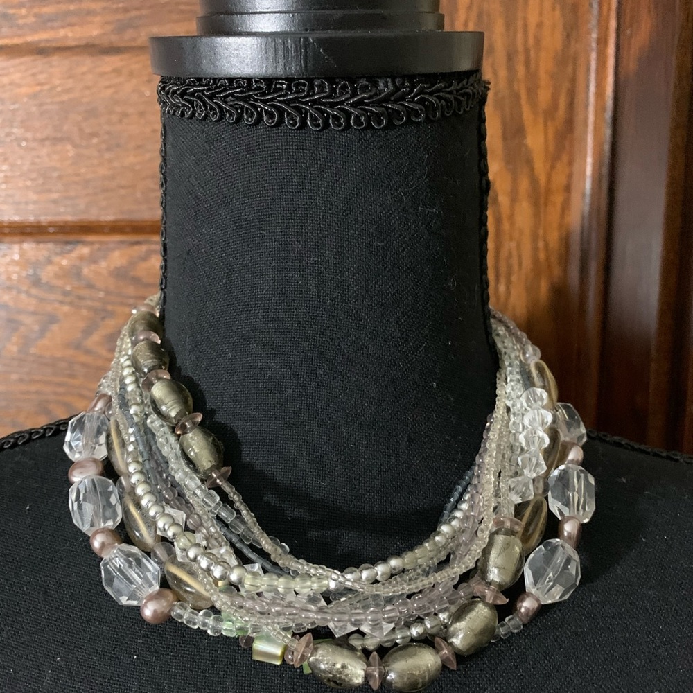 Beaded necklace approx. 9” with an extender to make longer.